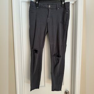 Maurice’s grey jeggings with distressing on knees.